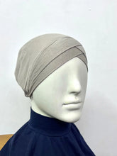 Criss cross cap