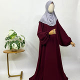 Maroon A-line abaya with baggy sleeves