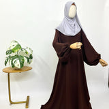 Brown A-line abaya with baggy sleeves
