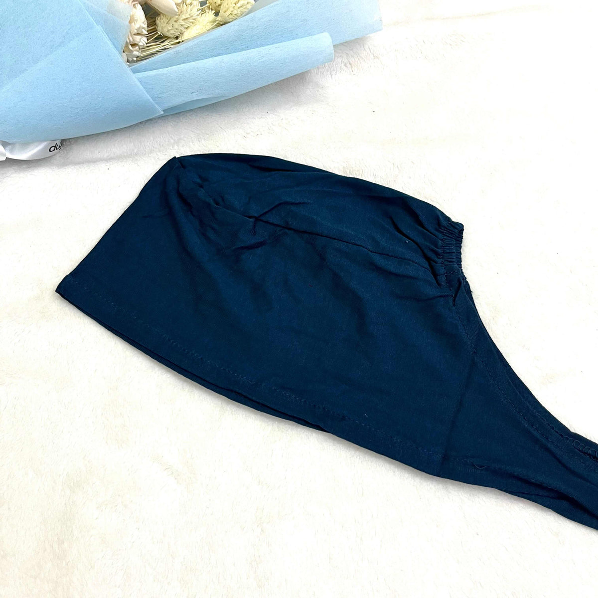 Tie Cap