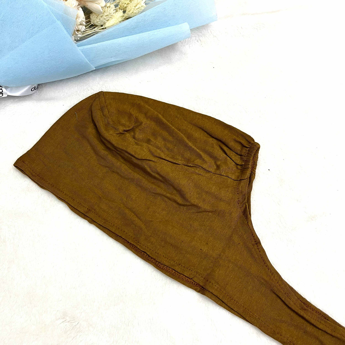 Tie Cap
